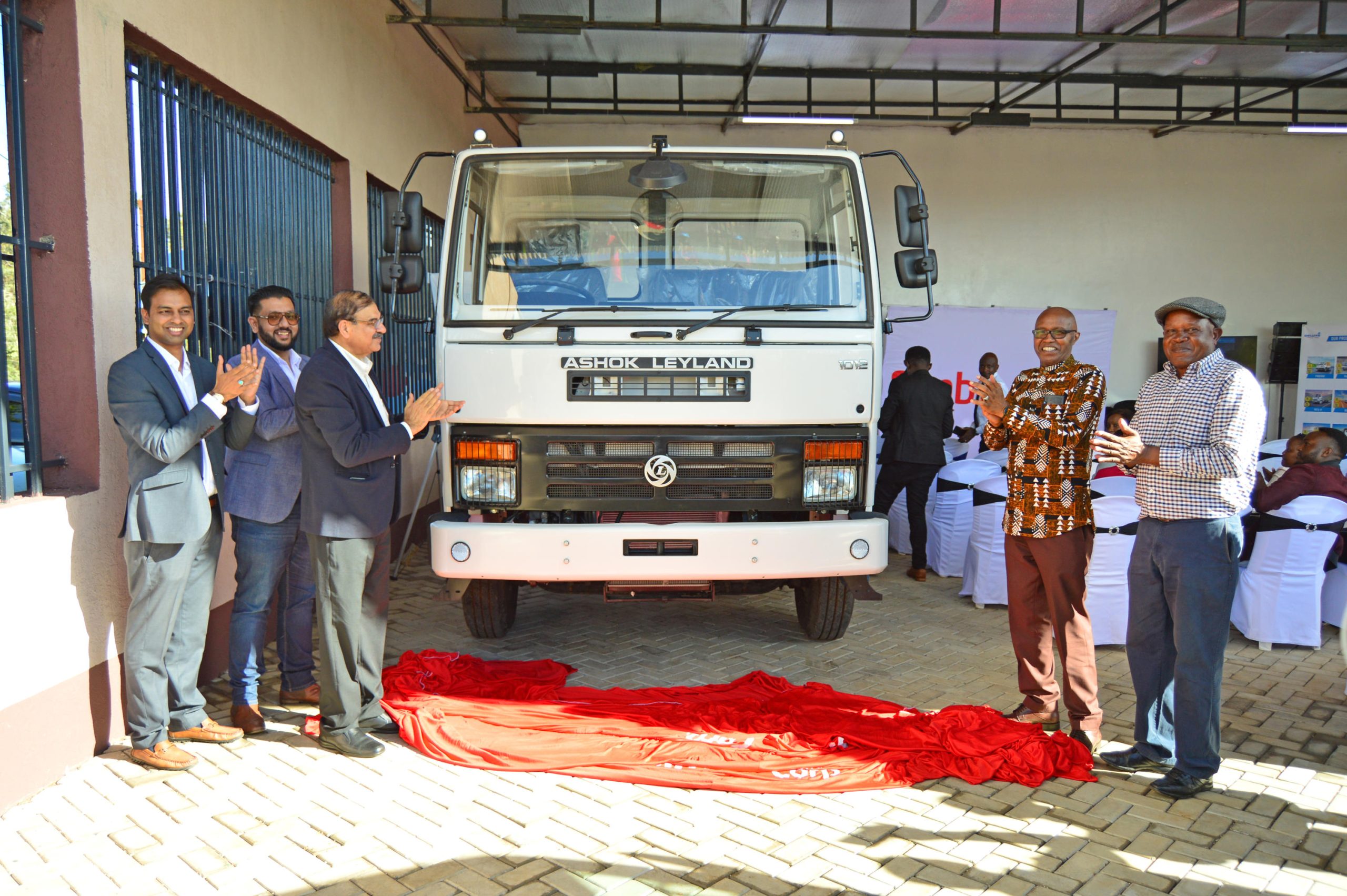 From L-R, Purujit Kishore, Ashok Leyland Kenya Country Manager, Mohamed Varvany, Chief Commercial Officer and Naresh Leekha, Group MD, Motors Division both from Simba Corporation with Dr. Kiringai Kamau, Agriculture, Livestock, fisheries and Cooperatives CEC, Murang’a County and Dr. Paul Rwambo, Director of Thika based Swanley Motors seen here as they unveil the new Ashok Leyland EComet 102 Truck in Kenya. Swanley Motors have been appointed the 3S dealers for Simba Corporation in Murang'a County.